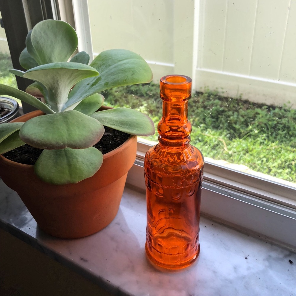 Small orange bottle (room decor)